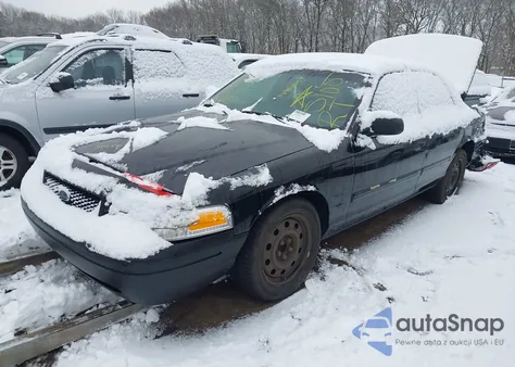 2011 Ford Crown Victoria Police Interceptor z USA, uszkodzony, nr VIN 2FABP7BVXBX159351